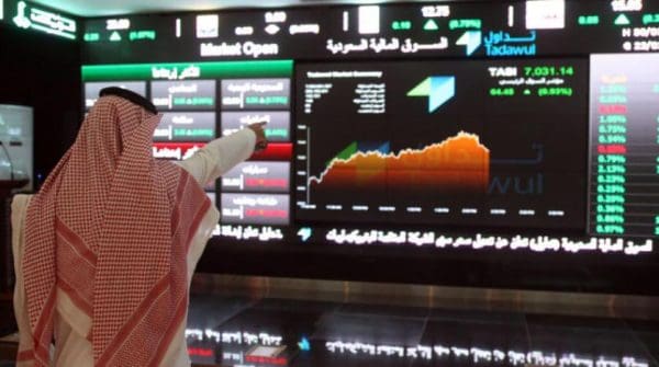 تداول الأسهم لغير السعوديين: كيف يتم؟ اكتشف الفرص الذهبية والإجراءات السهلة!